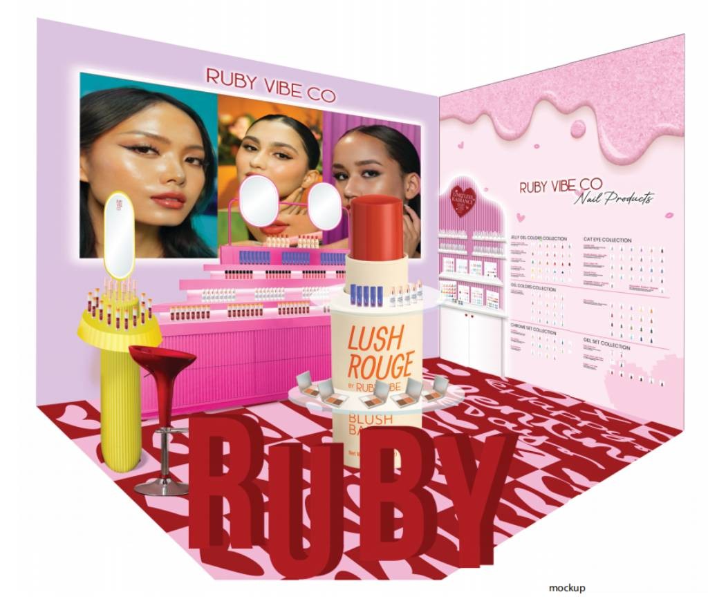 3D mockup of a Ruby Vibe Co pop-up booth corner, featuring displays for nail products and 'Lush Rouge' blush, with bold red and pink branding.